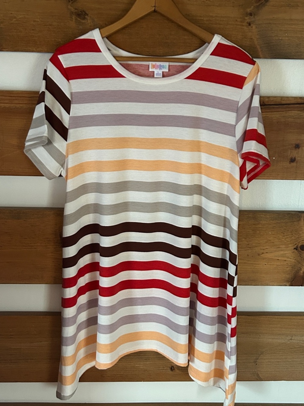 LuLaRoe Women’s Striped Casual
Flare Travel Short Sleeve Blouse Size Large